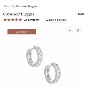 Uncommon James Silver cross over Huggies